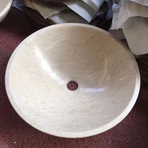 Sunčano žuto mramorno sudoper